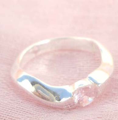 Great stamped 925 sterling silver curvy band with pinky cz ring