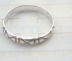 Stamped 925. silver ring with multi X design