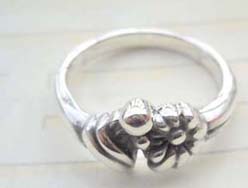 Quality 925. stamped silver flower ring