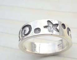 Swirl and star design,designer inspired 925. sterling silver ring