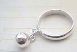 Outstanding 925. stamped silver ring with jingle bell design 