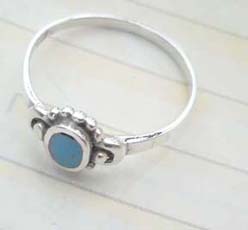 Beauty 925. stamped silver turquoise ring with bali silver bead design