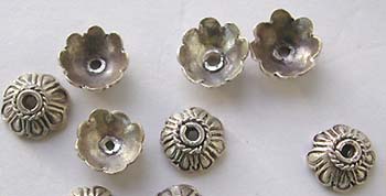 sterling silver jewelry charms, Bali silver beads and jewelry finding made of 925 sterling silver primitive tribe jewelry and tribal beads wholesale jewelry gifts distributor - wholesale quality fine sterling silver jewelry and Bali silver beads, findings. -wholesale jewelry products to the trade, traditional decoratio