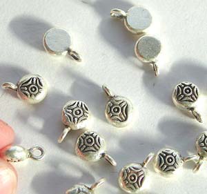 sterling silver jewelry charms, Bali silver beads and jewelry finding made of 925 sterling silver primitive tribe jewelry and tribal beads wholesale jewelry gifts distributor - wholesale quality fine sterling silver jewelry and Bali silver beads, findings. -wholesale jewelry products to the trade, traditional decoratio