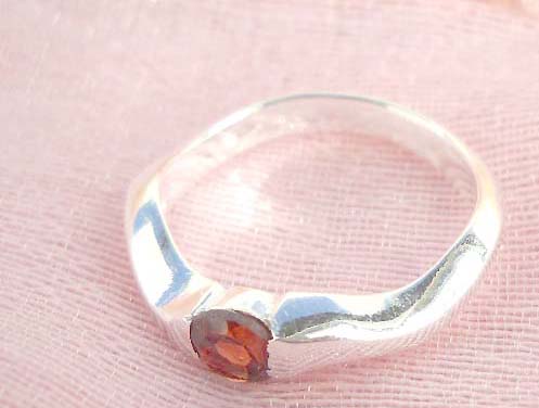 Great stamped 925 sterling silver curvy band with ruby cz ring