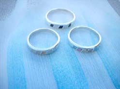 Fine 925. sterling silver ring with slotted design