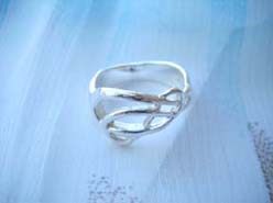 Trendy 925. stamped silver ring with cross over design
