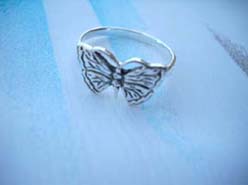 Trendy 925. stamped silver ring with butterfly design